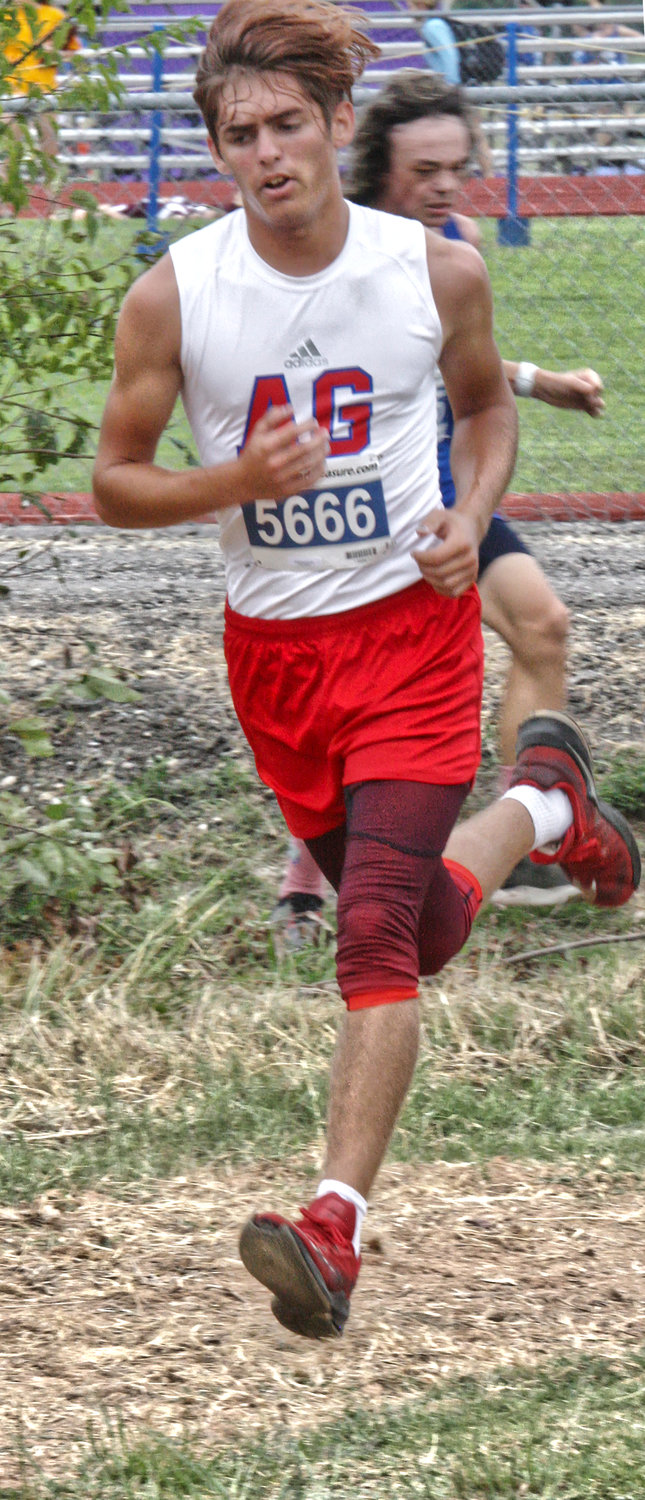 Alba-Golden’s Michael Kumm transitions from gravel to dirt at the Quitman Invitational.